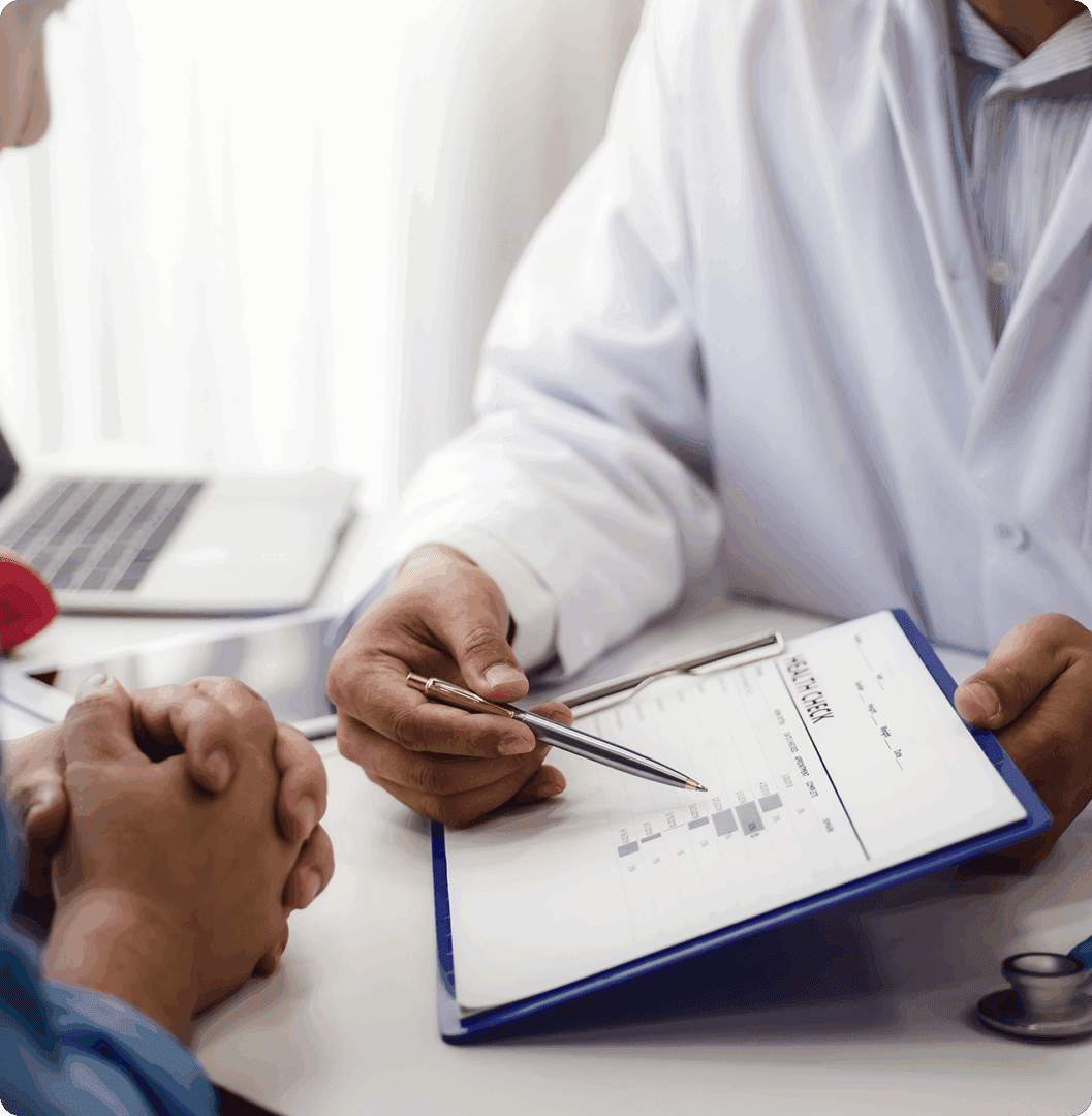 Doctor discussing chart with patient.